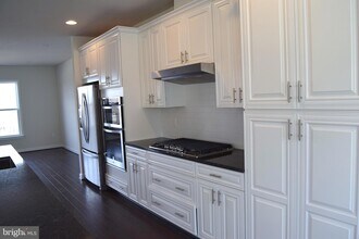 19974 Abram Ter, Unit 1012A in Ashburn, VA - Building Photo - Building Photo