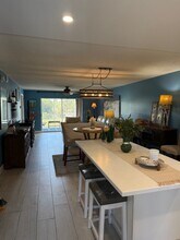 5635 Rattlesnake Hammock Rd in Naples, FL - Foto de edificio - Building Photo