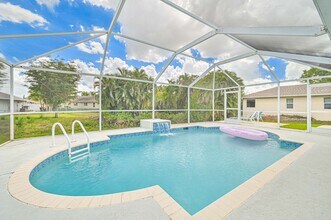 9232 Cypress Dr N in Ft. Myers, FL - Building Photo - Building Photo