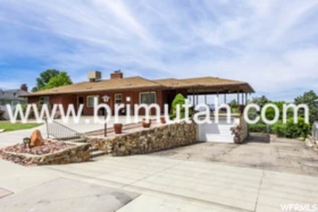 property at 7444 S 2300 E