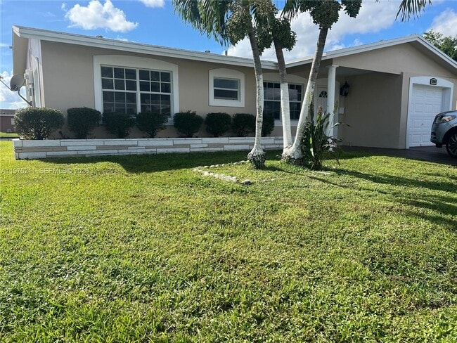 property at 5909 NW 67th Ave