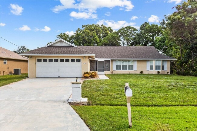 1799 SW Taurus Ln in Port St. Lucie, FL - Building Photo - Building Photo