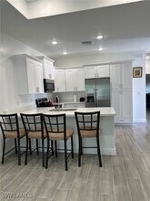 405 W 12th St in Lehigh Acres, FL - Foto de edificio - Building Photo