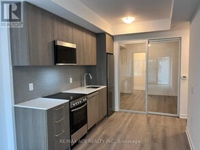 7439 Kingston Rd in Toronto, ON - Building Photo - Building Photo