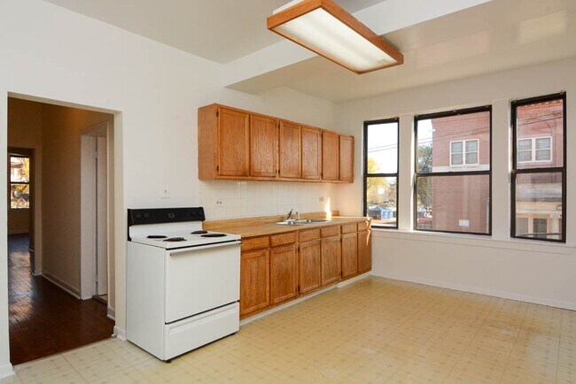 3145 W Medill Ave, Unit A09C in Chicago, IL - Building Photo - Building Photo