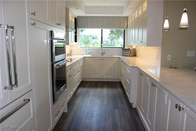 property at 6760 Pelican Bay Blvd