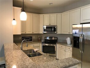 11875 Izarra Way in Ft. Myers, FL - Building Photo - Building Photo