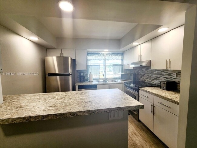 property at 9101 Lime Bay Blvd