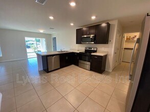 23211 McQueeney Ave in Port Charlotte, FL - Building Photo - Building Photo