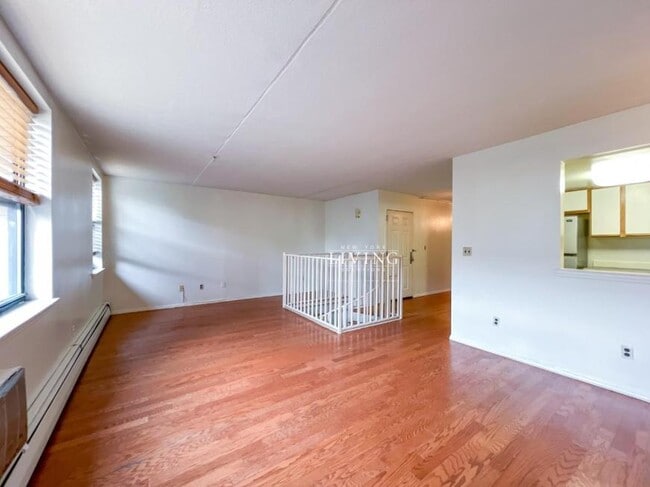 property at 233 W 121st St