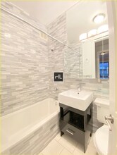 West 52nd Street, Unit 13E in New York, NY - Building Photo - Building Photo