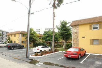 Poulos Village Apartments in Lantana, FL - Building Photo - Building Photo