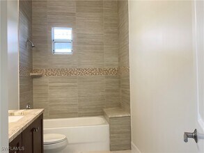 8217 Sanctuary Dr in Naples, FL - Building Photo - Building Photo