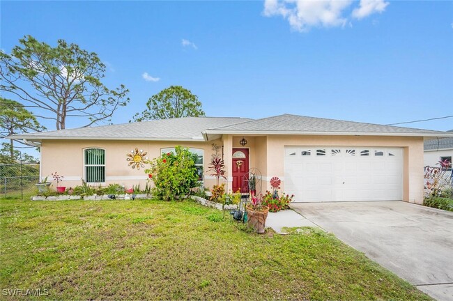 2432 Ted Ave S in Lehigh Acres, FL - Building Photo - Building Photo