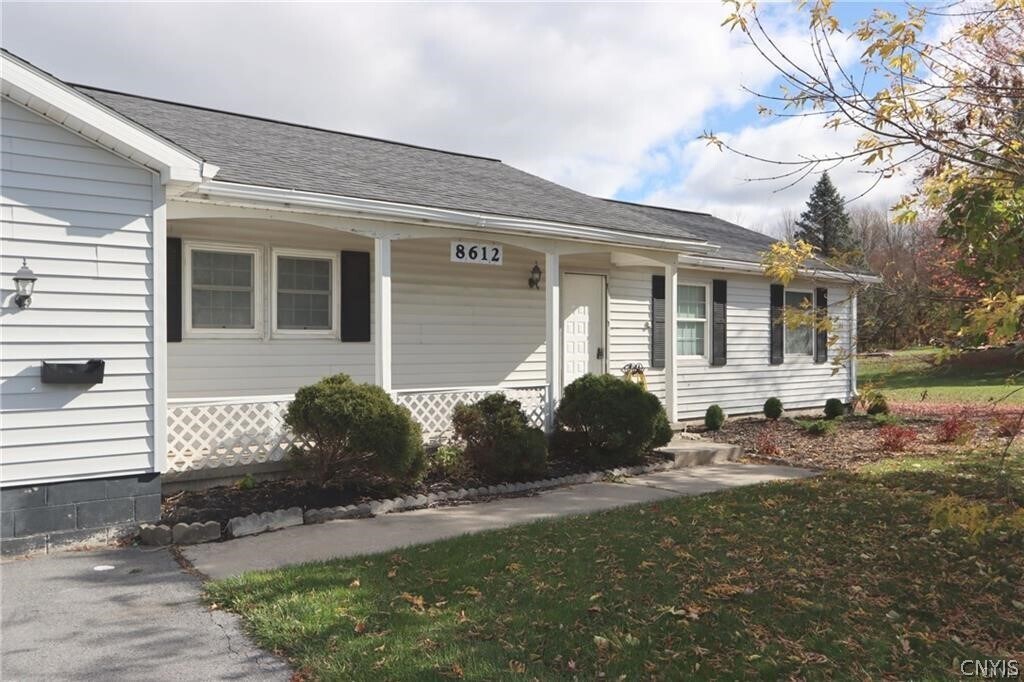 8612 Peck St in Evans Mills, NY - Building Photo