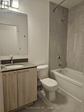 7437 Kingston Rd in Toronto, ON - Building Photo - Building Photo