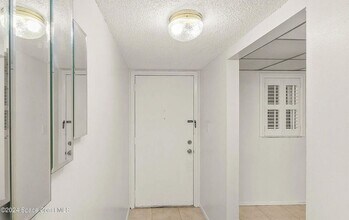 126 Lancha Cir in Indian Harbour Beach, FL - Building Photo - Building Photo