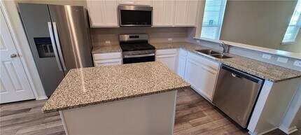 640 Pepperbark Loop in Mustang Ridge, TX - Building Photo - Building Photo