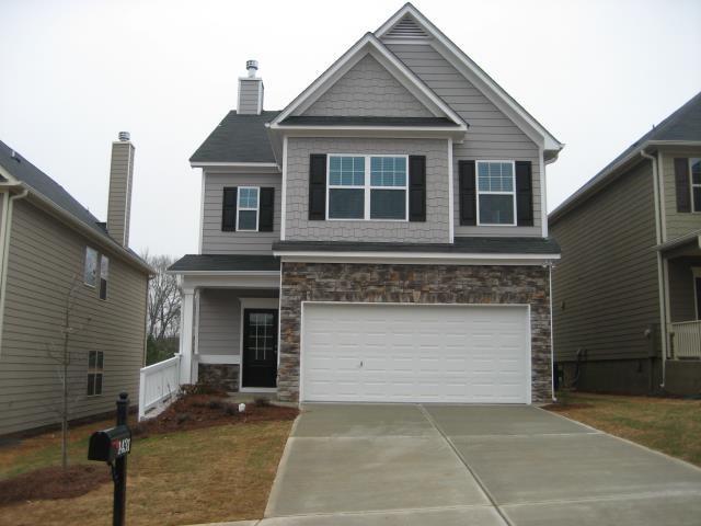 1431 Woodward Down Ct in Buford, GA - Building Photo