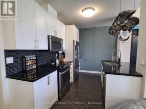 1419 Costigan Rd in Milton, ON - Building Photo - Building Photo