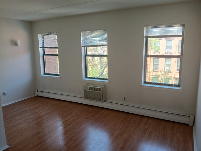 property at 112 W 128th St