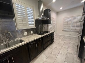 5761 W Olympic Blvd in Los Angeles, CA - Building Photo - Building Photo