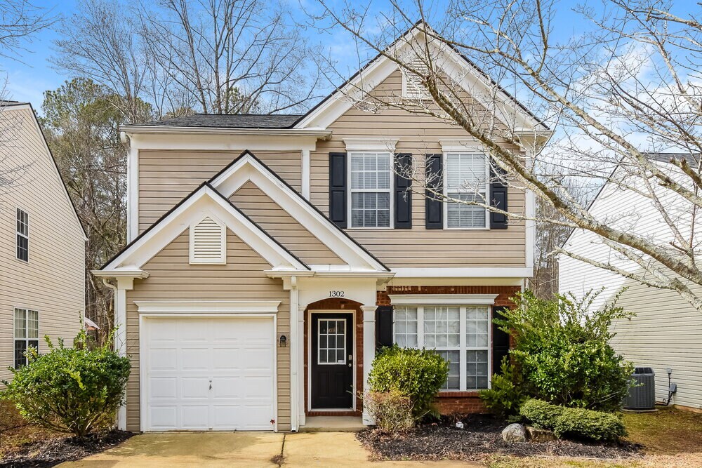 1302 Timuquana Trail in Woodstock, GA - Building Photo