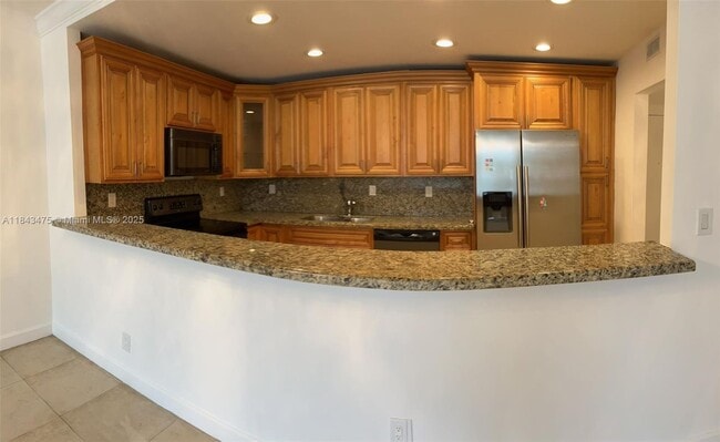 property at 19390 Collins Ave