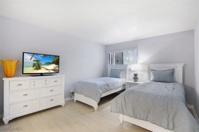 property at 5954 Pelican Bay Blvd