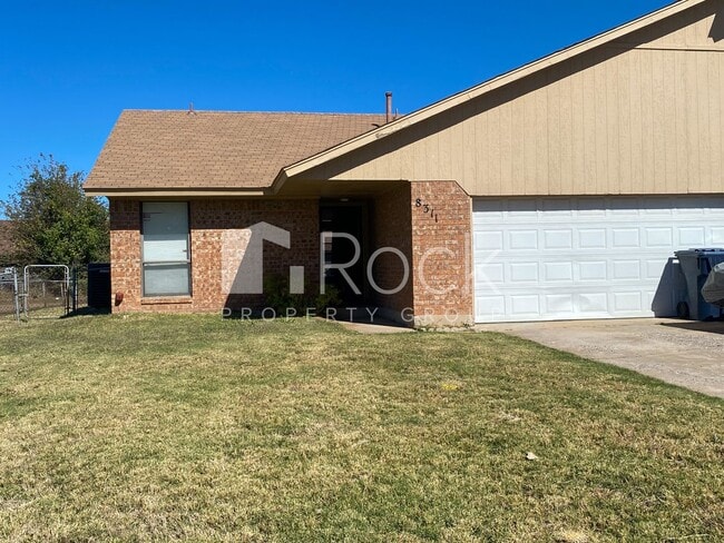 property at 8309 NW 7th St