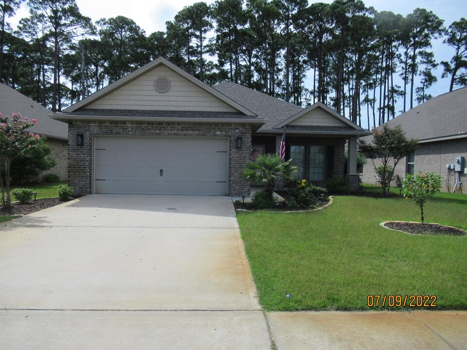 606 Cocobolo Dr in Santa Rosa Beach, FL - Foto de edificio