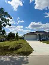 5021 24th St SW, Unit 5021 in Lehigh Acres, FL - Foto de edificio - Building Photo