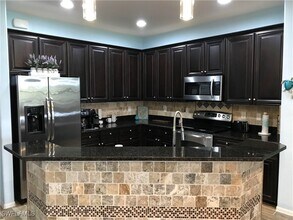11908 Izarra Way in Ft. Myers, FL - Building Photo - Building Photo