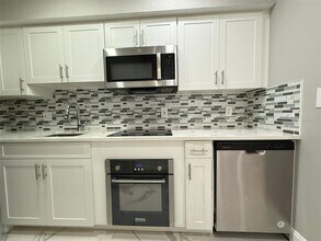 9258 Lake Chase Island Way in Westchase, FL - Building Photo - Building Photo