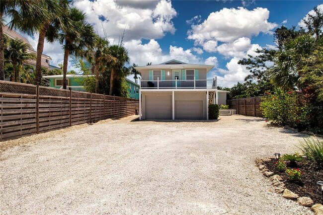 property at 9033 Midnight Pass Rd
