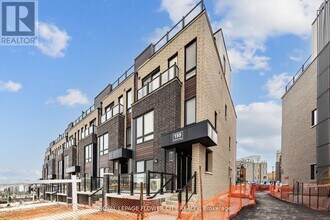 155 Tapscott Rd in Toronto, ON - Building Photo - Building Photo