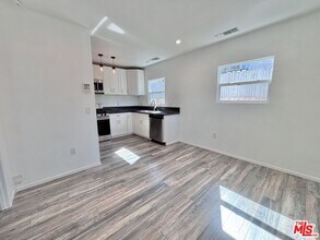 3774 S Gramercy Pl in Los Angeles, CA - Building Photo - Building Photo