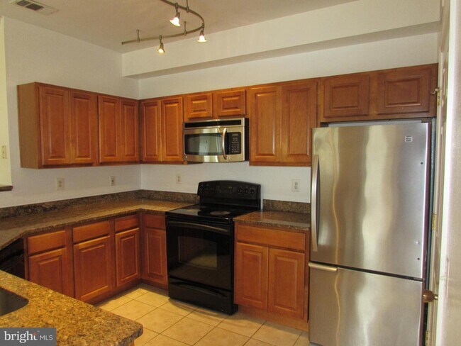 1550 Spring Gate Dr.-Unit -8206 in McLean, VA - Building Photo - Building Photo