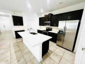 6089 Wildfire Way in West Palm Beach, FL - Foto de edificio - Building Photo