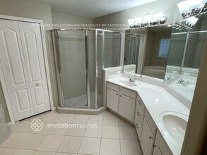 27 Oakland Pointe Cir in Oakland, FL - Foto de edificio - Building Photo