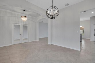 1445 SW Leisure Ln in Port St. Lucie, FL - Building Photo - Building Photo