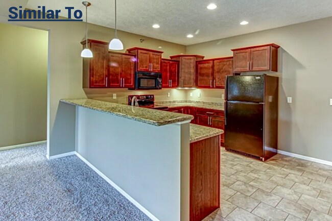 7446 S Louise Ave in Sioux Falls, SD - Foto de edificio - Building Photo