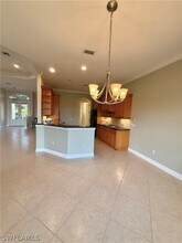 5031 Rustic Oaks Cir in Naples, FL - Building Photo - Building Photo