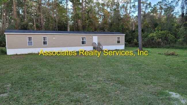 property at 5898 NW 218 Ave
