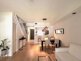 1018 Woodshire Ln, Unit A202 in Naples, FL - Building Photo