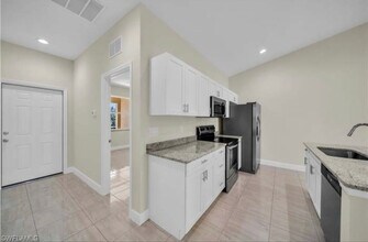 2118 Zaharihas Dr in Lehigh Acres, FL - Building Photo - Building Photo