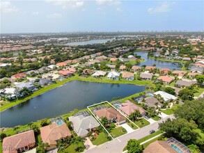 7699 Groves Rd in Naples, FL - Building Photo - Building Photo