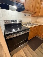 718 Village Ln, Unit 16 in Newburgh, IN - Foto de edificio - Building Photo