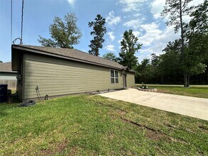 15063 Arrowhead Loop E in Willis, TX - Building Photo - Building Photo