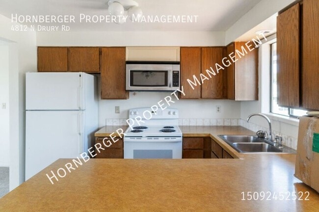 4812 N Drury Rd in Otis Orchards, WA - Foto de edificio - Building Photo